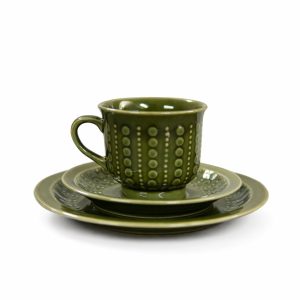 Grön vintage kopp med fat och assiett